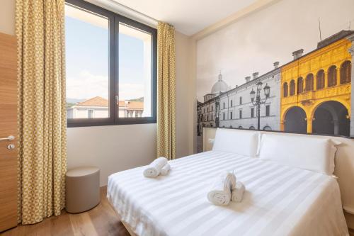 Postel nebo postele na pokoji v ubytování B&B Hotel Brescia