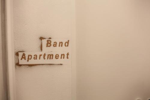 a door with a sign that says band appointment on it at Convent-Βand Αpartment in Kalabaka