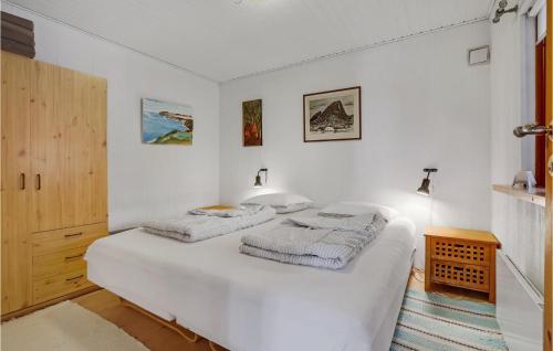 Katil atau katil-katil dalam bilik di Holiday Home Tjørnevænget Broager Iii
