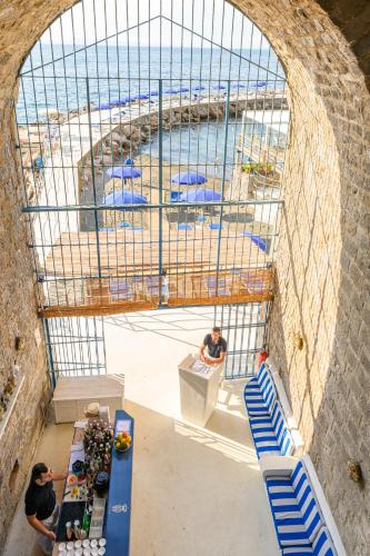 a view of the beach from the top of a building at Parco dei Principi in Sorrento