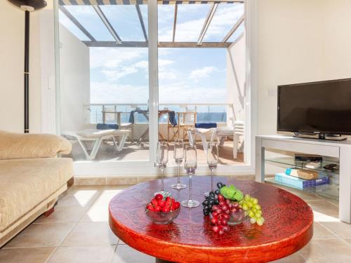 TV a/nebo společenská místnost v ubytování Apartment Triplex Mare Nostrum by Interhome