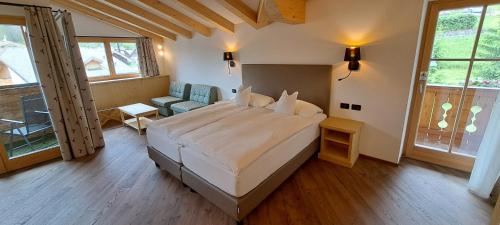 A bed or beds in a room at La Campagnola