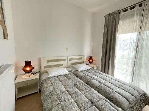 A bed or beds in a room at Michael's House - Argostoli