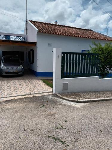a car parked in front of a house at Casa marreiros in Aljezur
