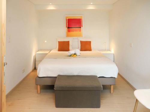 Una cama o camas en una habitación de Chalet La tintaz by Interhome