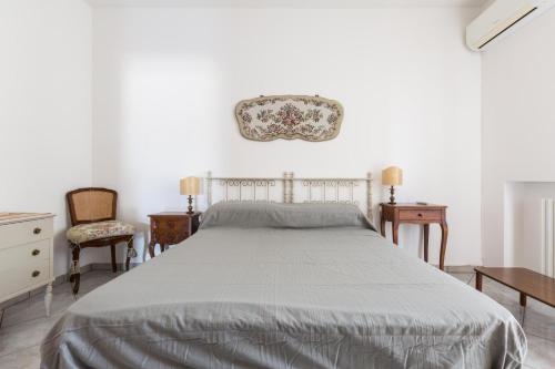 Ένα ή περισσότερα κρεβάτια σε δωμάτιο στο Margaret House by BarbarHouse