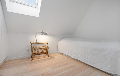 Ένα ή περισσότερα κρεβάτια σε δωμάτιο στο 4 Bedroom Stunning Home In Knebel