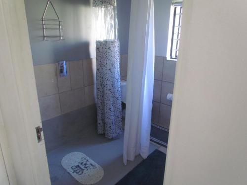Ванная комната в Santini Lace Self Catering Unit