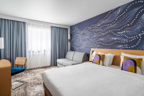 Postel nebo postele na pokoji v ubytování Novotel Paris Charenton le Pont