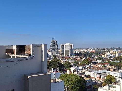 a view of a city from a building at Departamento Cofico in Cordoba