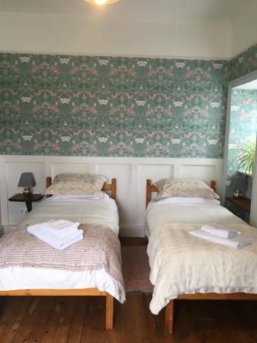 Postel nebo postele na pokoji v ubytování Le Presbytère Chambre D'Hôtes