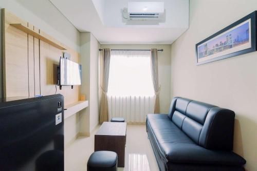 Gallery image of Homey and Minimalist 1BR Royal Sentul Park Apartment By Travelio in Bogor