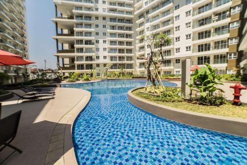 Πισίνα στο ή κοντά στο Brand New 2BR Apartment Gateway Pasteur By Travelio