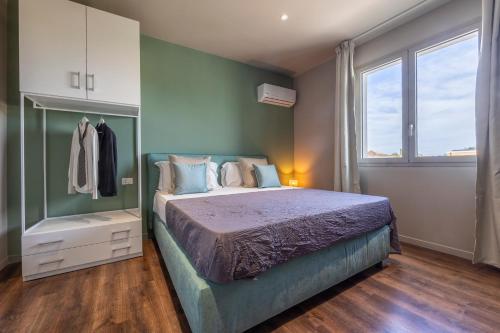 Postel nebo postele na pokoji v ubytování Baitan Hotel