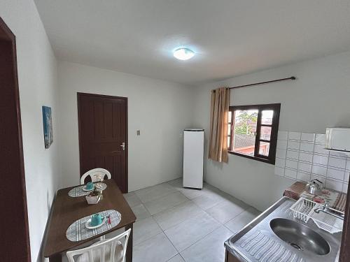 Kuchyň nebo kuchyňský kout v ubytování Hotel & Pousada Bella Vista