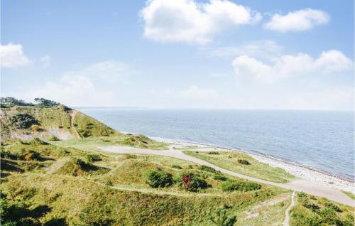 a view of the ocean from the top of a cliff at Awesome Home In Nykøbing Sj With Wifi in Klint