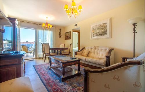 a living room with a couch and a table at 3 Bedroom Stunning Apartment In Calpe in Calpe