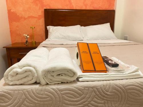 Katil atau katil-katil dalam bilik di AMV Hotel, Events Place & Restaurant