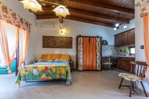 Postel nebo postele na pokoji v ubytování Villetta Isabella a Torre San Giovanni