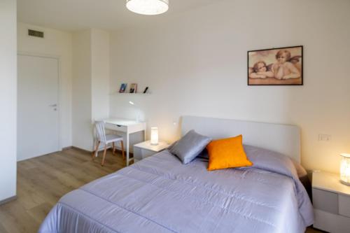 Postel nebo postele na pokoji v ubytování Residenza La Ruota Camelia