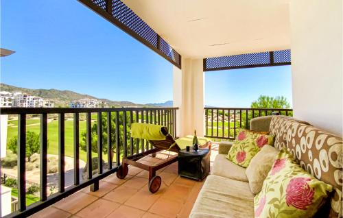a living room with a couch and a balcony at Amazing Apartment In Baños Y Mendigo in Baños y Mendigo