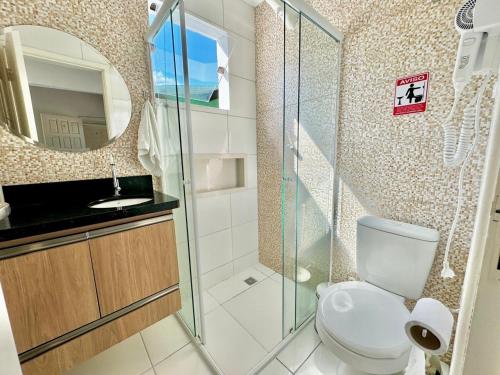Ένα μπάνιο στο Apartamentos Recanto da Barra
