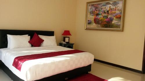 Una cama o camas en una habitación de Terrace Bali Villa