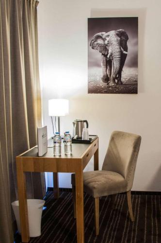 Χώρος καθιστικού στο Le Lodge Brit Hotel Strasbourg Zenith