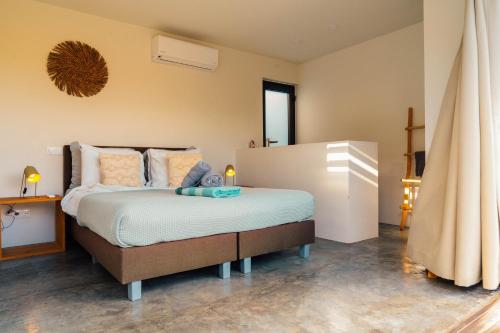 Postel nebo postele na pokoji v ubytování Naturescape Villa Zen - Sint Michiel