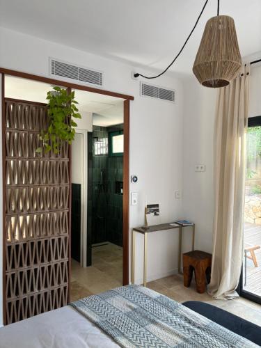 Ένα ή περισσότερα κρεβάτια σε δωμάτιο στο Maison Lumio