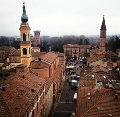 an overhead view of a city with buildings and a street at B&B La Fontana in Spilamberto