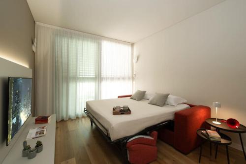 Televisyen dan/atau pusat hiburan di Cicerone Apartment