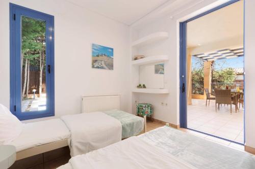 Posteľ alebo postele v izbe v ubytovaní Villa Luisa Corfu by Villa Plus