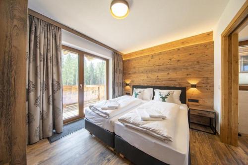 Postel nebo postele na pokoji v ubytování Nationalpark Chalet Kratzenberg