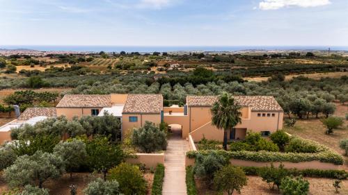 an aerial view of a villa with trees at Planeta Country House & Beach Club in Menfi