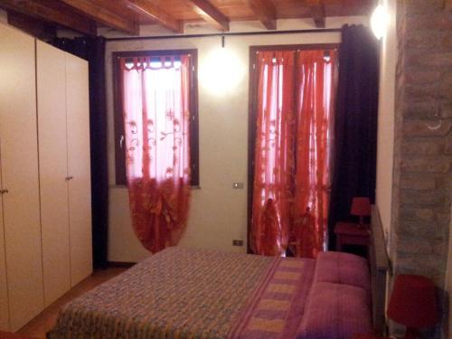 Katil atau katil-katil dalam bilik di Via Toscana House