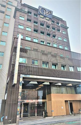 a large building with a audi sign on it at Well Garden Hotel in Taoyuan