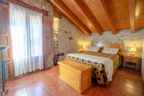 Postel nebo postele na pokoji v ubytování Casa Enduella