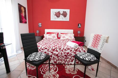 Letto o letti in una camera di Villa Regina Accommodation