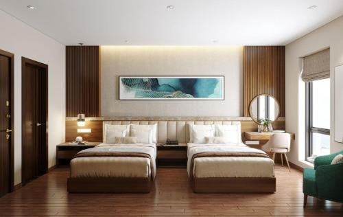 a hotel room with two beds in a room at Lucasta Hotel Ha Long in Ha Long