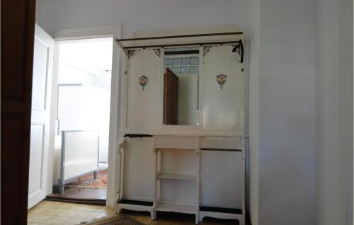 a bathroom with a sink and a mirror at Stunning Apartment In Waabs With Wifi in Waabs
