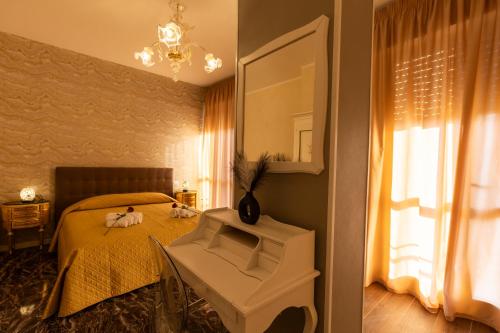 Ένα ή περισσότερα κρεβάτια σε δωμάτιο στο Amy Rooms