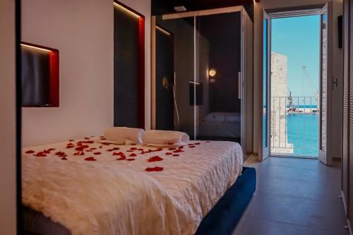 Ένα ή περισσότερα κρεβάτια σε δωμάτιο στο Dimora Bicetta