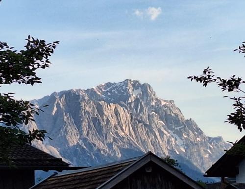 a view of a large mountain in the distance at Hotel Gasthof Alter Wirt in Farchant