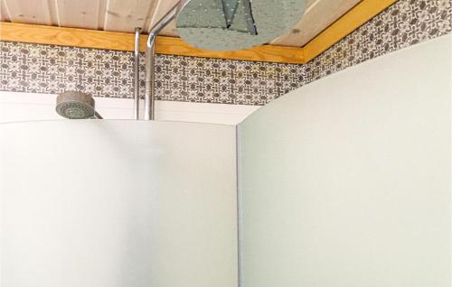 a room with a white wall and a ceiling at Lovely Home In Lofsdalen With Kitchen in Lofsdalen