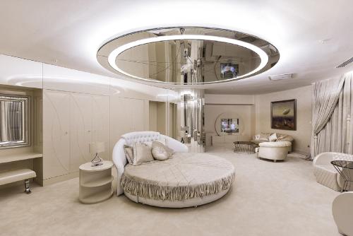 a large living room with a large chandelier at Ramada by Wyndham Sakarya Hotel in Sakarya