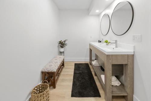 a bathroom with a sink and a mirror at Willow - 99 Ridge Lane in Branson