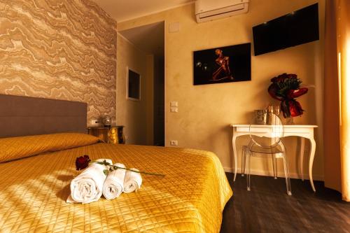 Ένα ή περισσότερα κρεβάτια σε δωμάτιο στο Amy Rooms