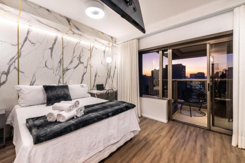 Katil atau katil-katil dalam bilik di Rosemari's Apartments 4 Studios Luxuosos
