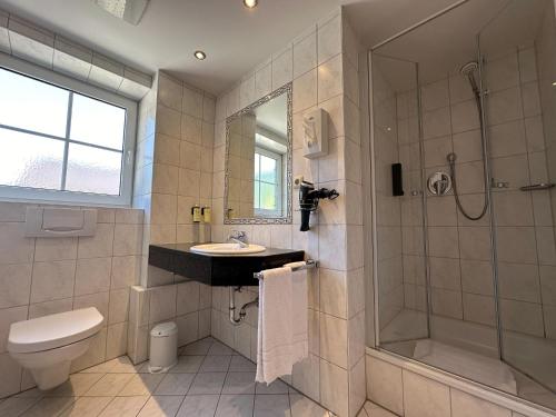 Koupelna v ubytování Hotel Gasthof Alter Wirt